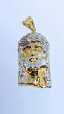 Pendentif Jésus en or bicolore taillé au diamant
