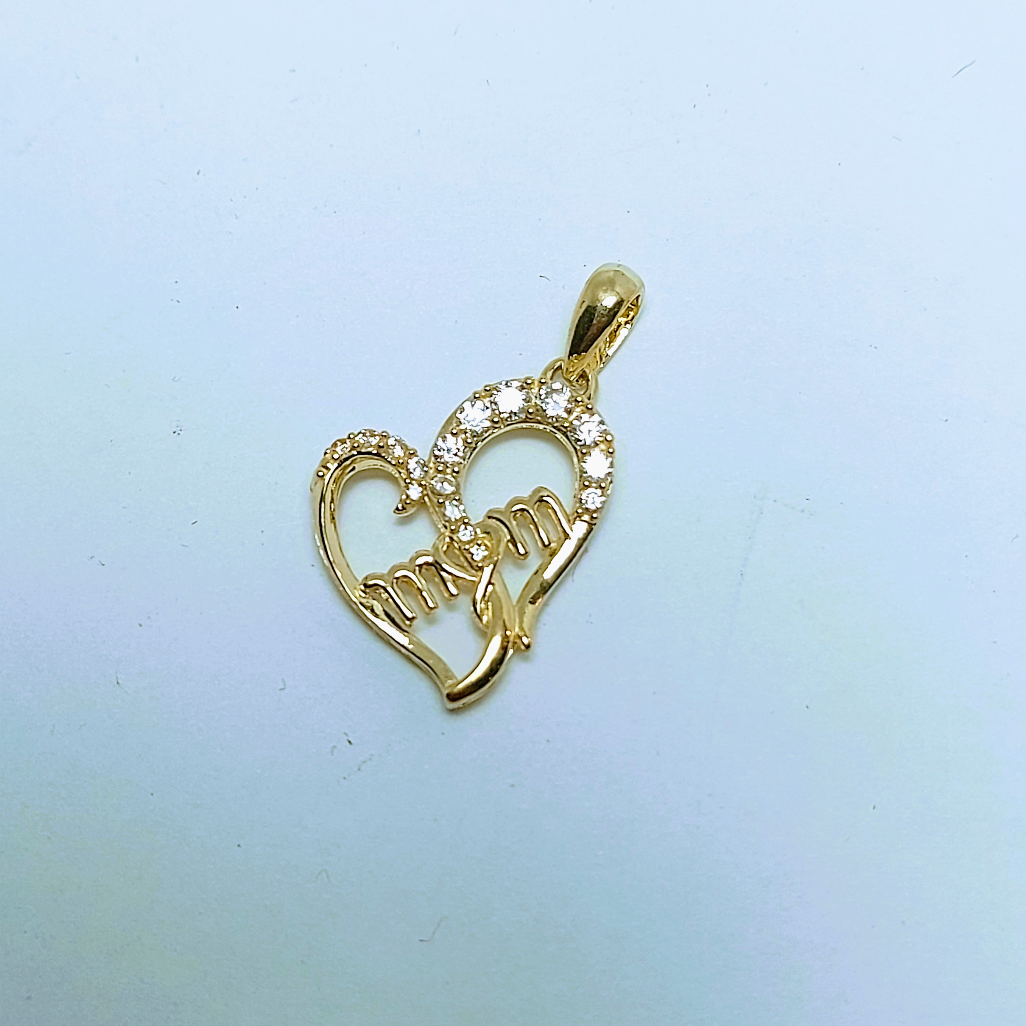 Pendentif cœur en or avec maman à l'intérieur