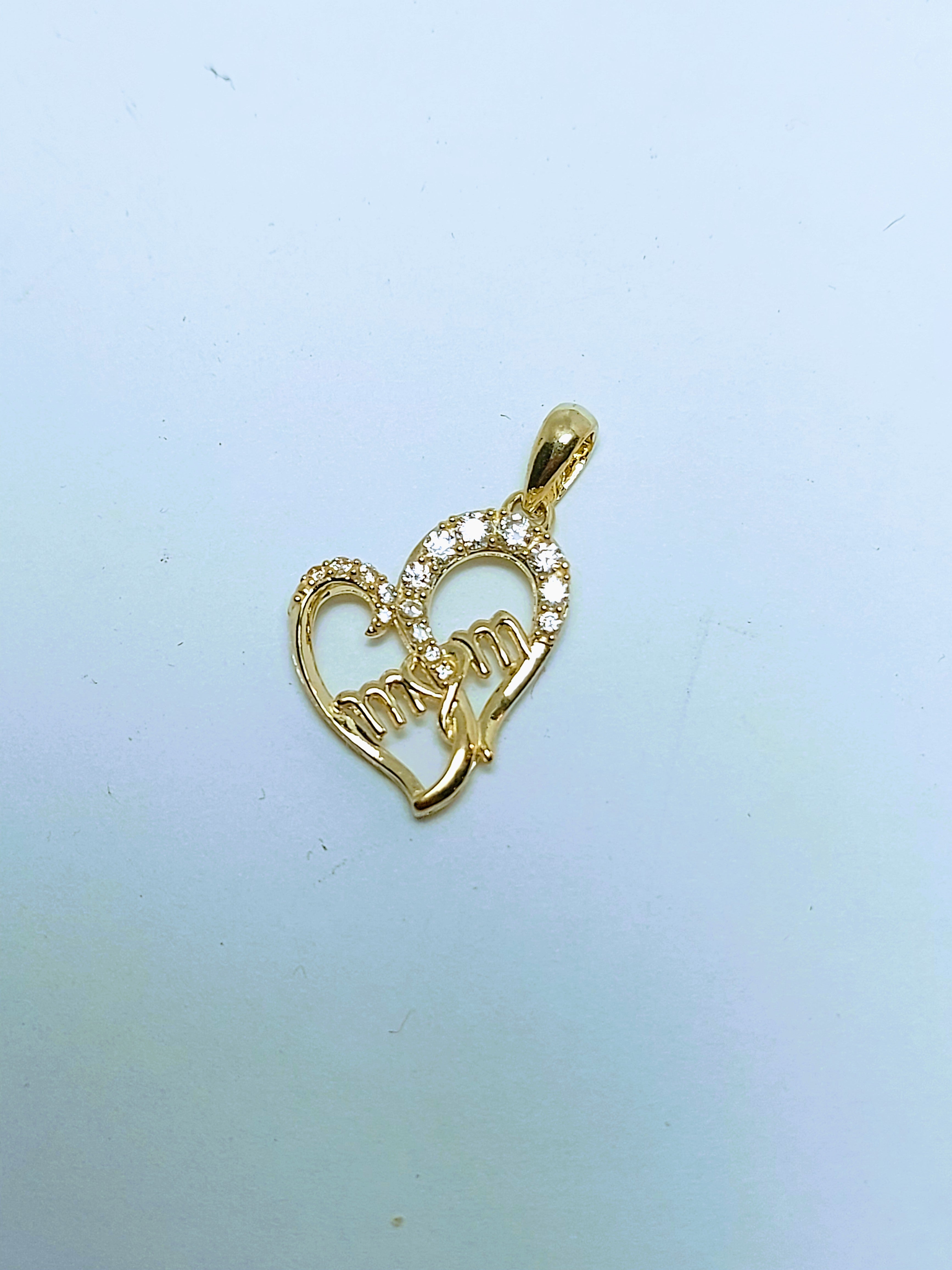 Pendentif cœur en or avec maman à l'intérieur