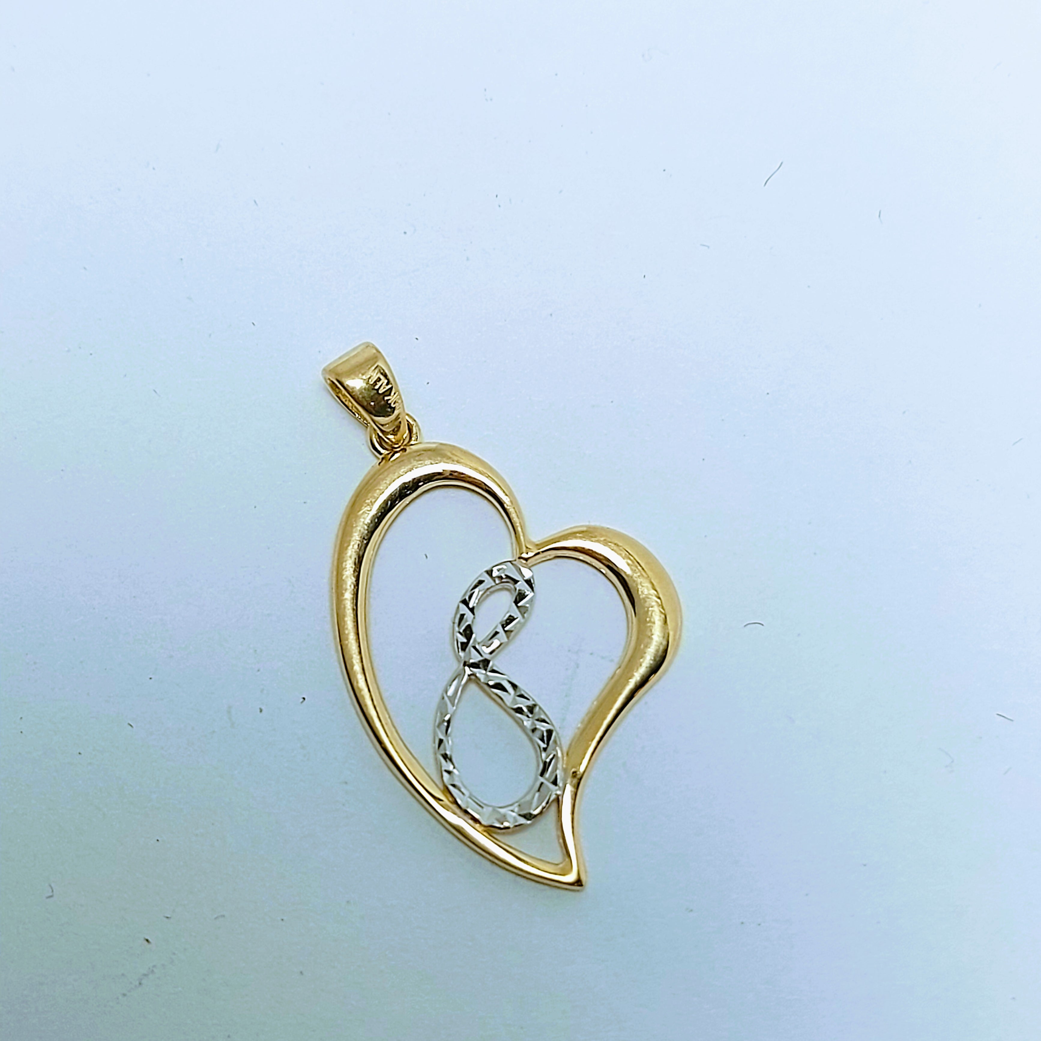 Pendentif en or cœur avec infini
