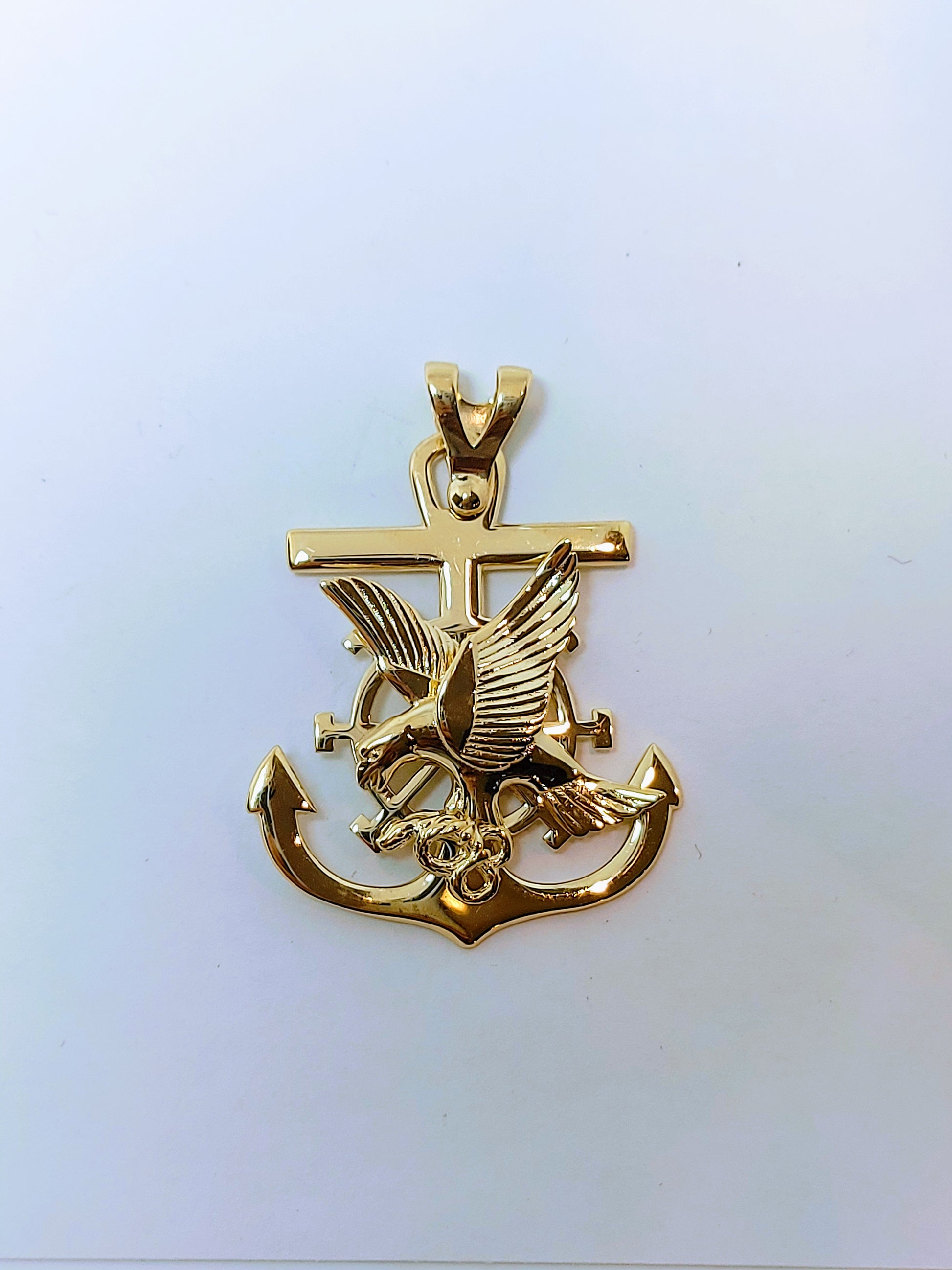 Cross with anchor and hawk gold pendant