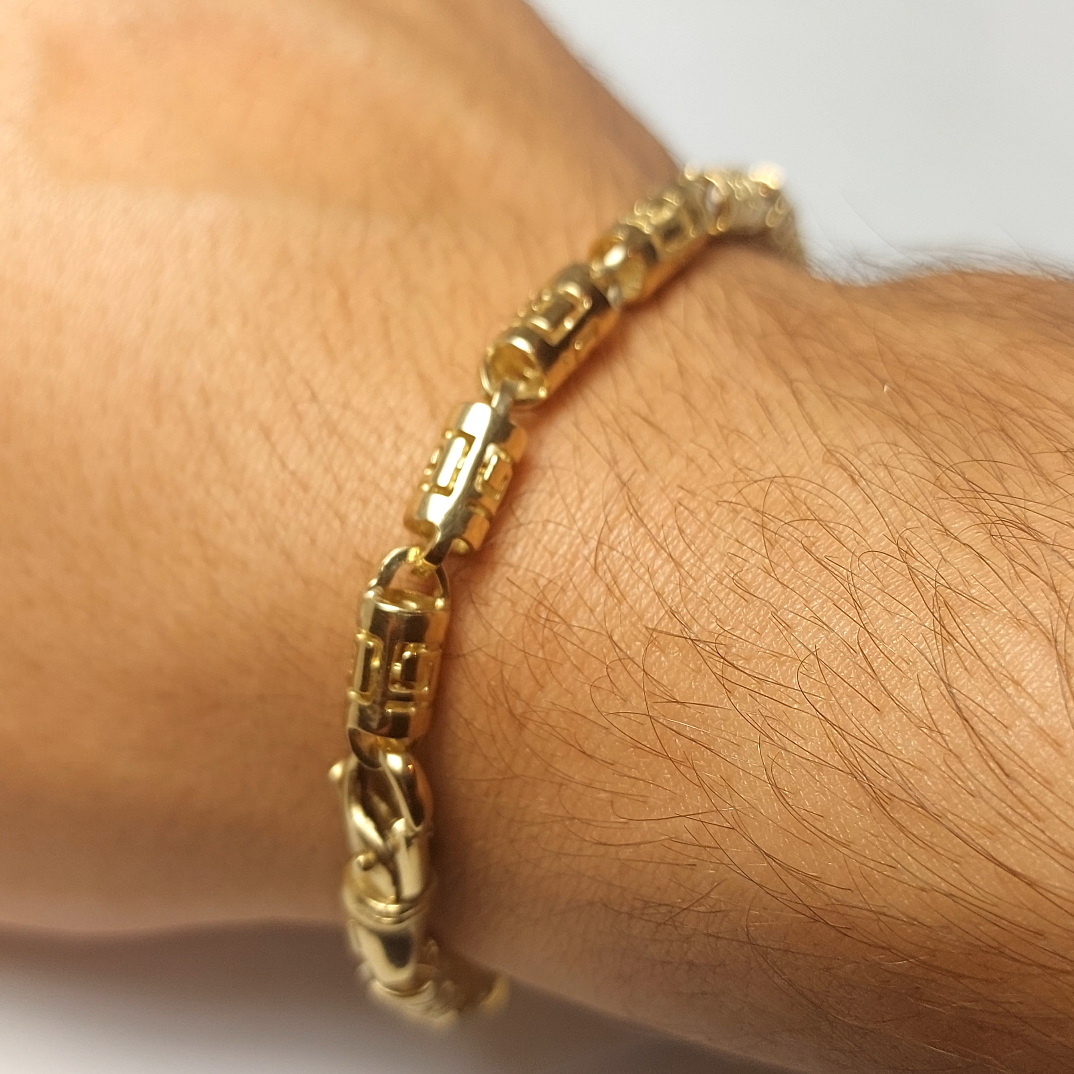 Men's gold bracelet with Greek design