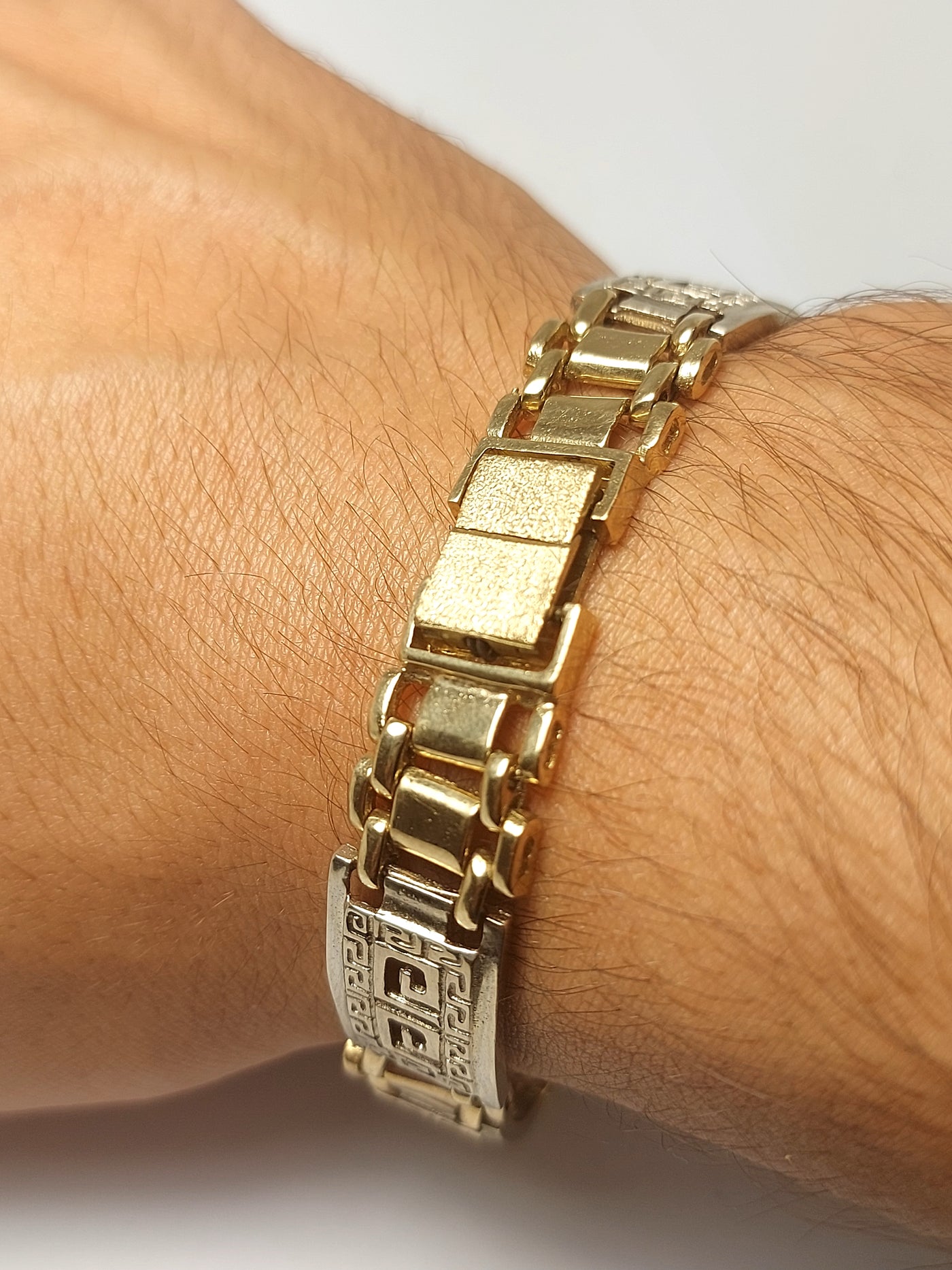 Men's gold bracelet with g lock and Greek design
