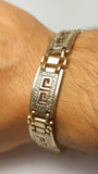 Men's gold bracelet with g lock and Greek design
