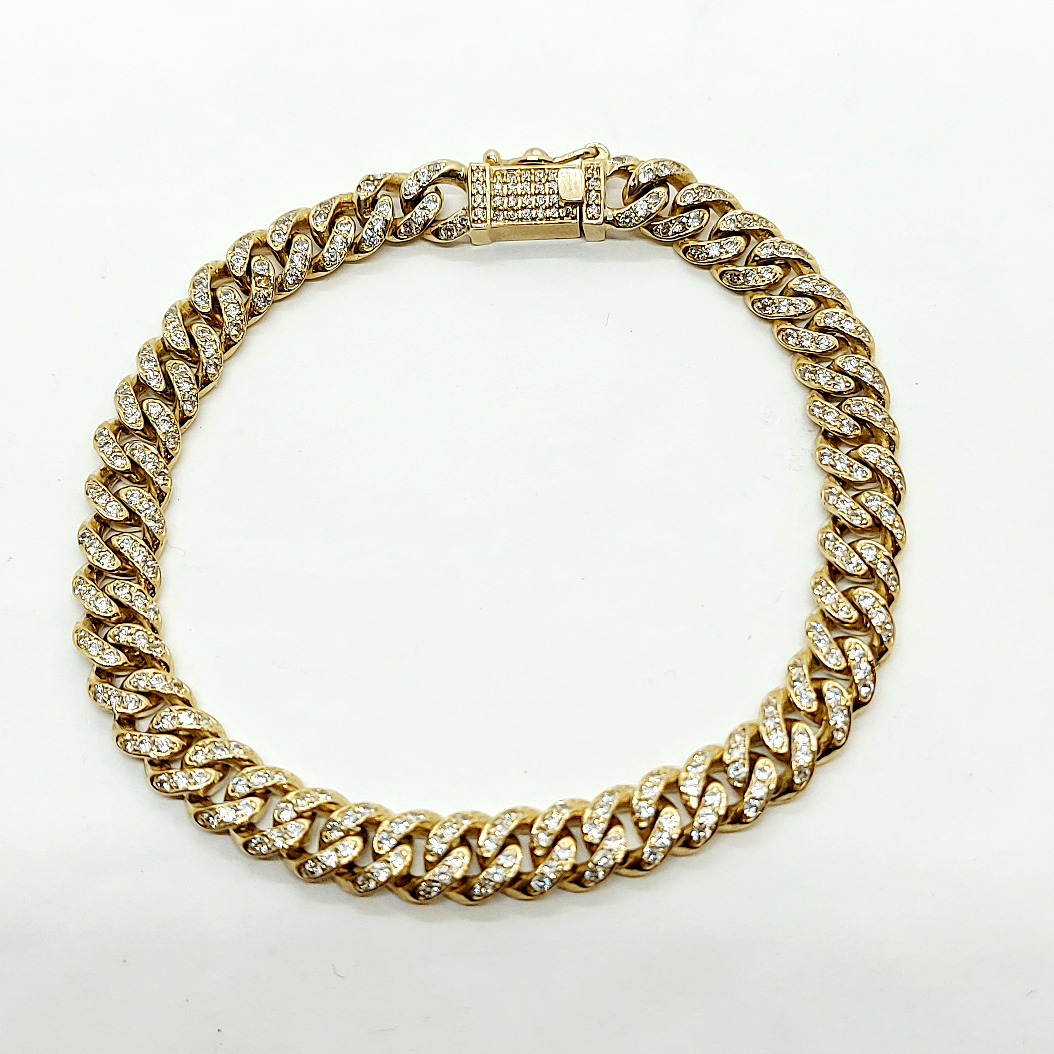 Solid gold tight Cuban bracelet with diamonds
